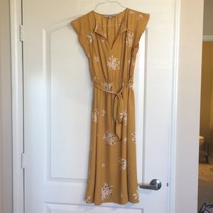 Yellow floral midi dress.